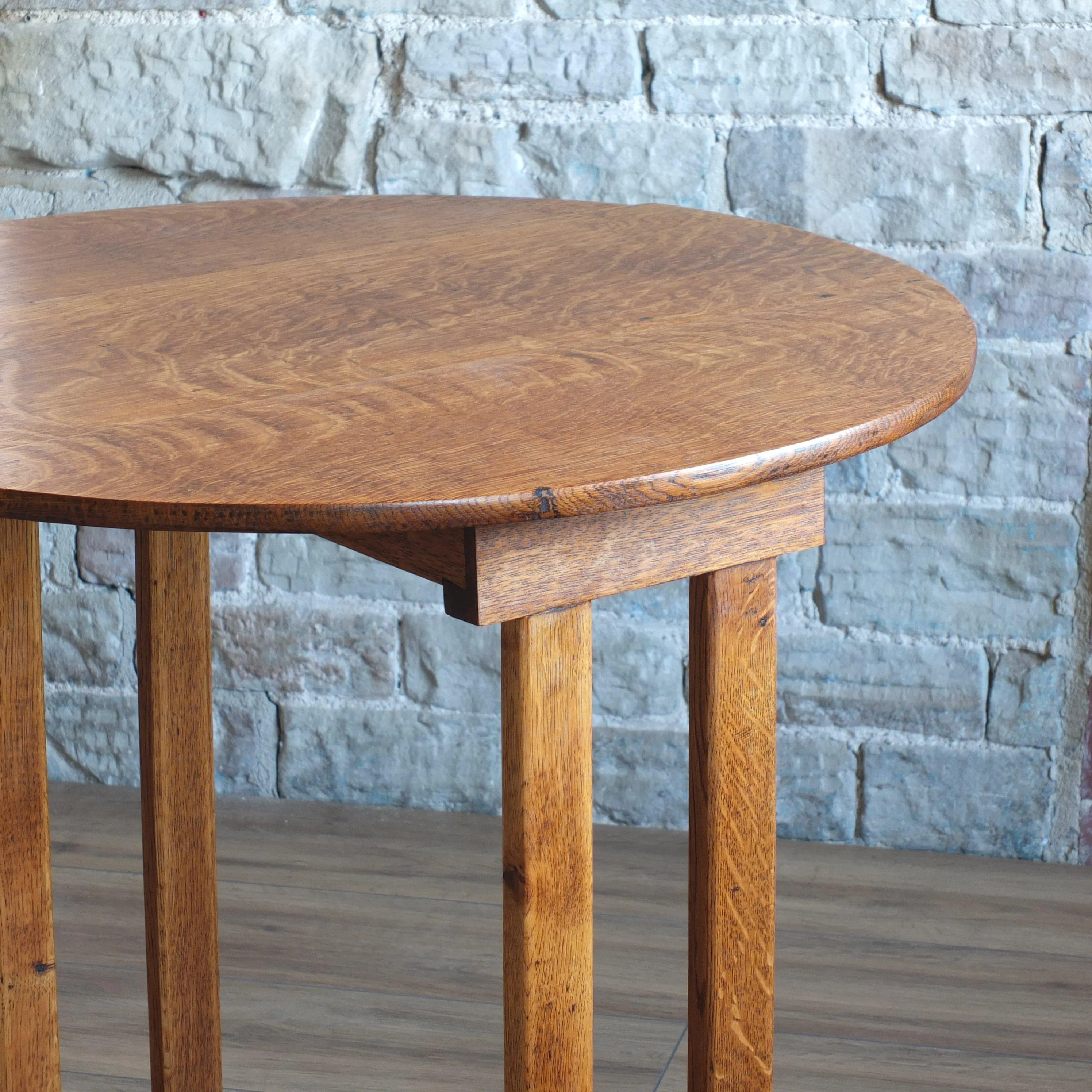 Oak arts and crafts twist top drop leaf table