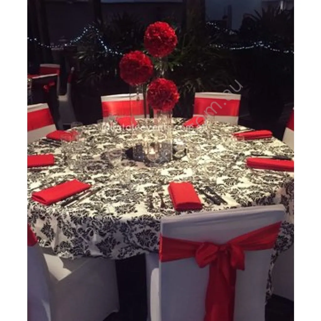 Red pomander on cylinder vases